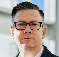 Alexander Hughes CEO-portret leidinggevende cryptohandelsbedrijf